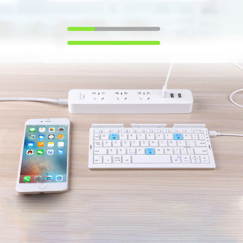 🌞Fris De Lente In Met 50% Korting!🎹 Opvouwbaar Mini Bluetooth-toetsenbord – Magnetische standaard, universeel compatibel & lange batterijduur, draagbaar voor telefoon/tablet/laptop - Image 4