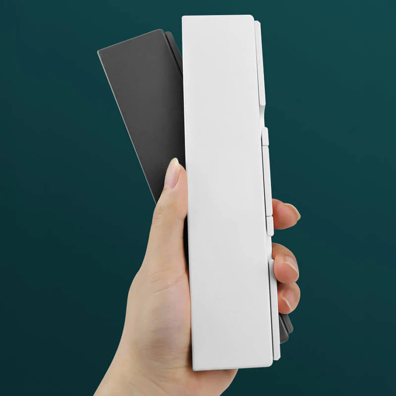 🌞Fris De Lente In Met 50% Korting!🎹 Opvouwbaar Mini Bluetooth-toetsenbord – Magnetische standaard, universeel compatibel & lange batterijduur, draagbaar voor telefoon/tablet/laptop - Image 7